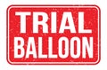 TRIAL BALLOON, words on red rectangle stamp sign