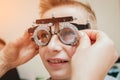 Trial frame. Glasses for a little boy. Ametropia correction with glasses. Royalty Free Stock Photo