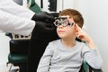 Trial frame. Glasses for a little boy. Hypermetropia. Ametropia correction with glasses Royalty Free Stock Photo
