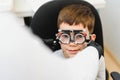 Trial frame. Glasses for a little boy. Hypermetropia. Ametropia correction with glasses Royalty Free Stock Photo