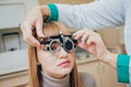 Trial frame. Glasses for a young woman. Ametropia correction with glasses. Royalty Free Stock Photo