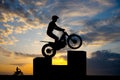 Trial motocross silhouette at sunset