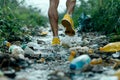 trial runner picking up trash , global environment pollution. Ai generated Royalty Free Stock Photo