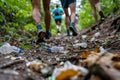 trial runner picking up trash , global environment pollution. Ai generated Royalty Free Stock Photo