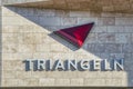 Triangeln shopping mall triangular symbol crossed by a triangular shadow on the Swedish shopping center facade. Malmo, Sweden