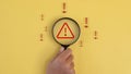 Triangle caution warning sign for notification error and maintenance, Internet malware viruses destroying computer data.