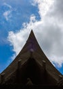 Triangle of in front of Thai roof style with blue sky. Royalty Free Stock Photo
