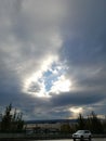 Triangle hole in clouds