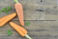 Triangle made of tasty ripe carrots on wooden rustic Royalty Free Stock Photo