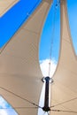 Triangle modern luxury awning with blue sky and sunshine reflection