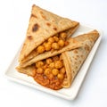 Triangle paratha with chole isolated on white background Royalty Free Stock Photo