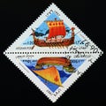 Triangle postage stamp Afghanistan 1997. Russian Warship and Genoese Merchant Ship