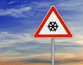 Triangle on rod road sign for cold with cloudy sky Royalty Free Stock Photo