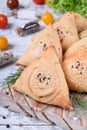 Triangle samsa meat pastry with sesame seeds Royalty Free Stock Photo