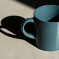 A triangle of shadow inside the mug suggests an empty interior Royalty Free Stock Photo