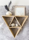 Triangle shelf with paper animals