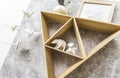 Triangle shelf with paper animals