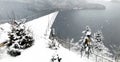 Triangle viewpoint of Hallstatt Winter snow mountain landscape hike epic mountains outdoor adventure and lake through the pine Royalty Free Stock Photo