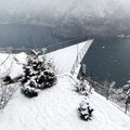 Triangle viewpoint Hallstatt Winter snow mountain landscape hike epic mountains outdoor adventure and lake through the pine Royalty Free Stock Photo