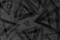 Triangles in black and grey tones creating a confusing, random and abstract composition. Royalty Free Stock Photo