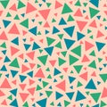 Triangles - geometrical seamless pattern. Blue, green, pink chaotic triangles. ApriÃÂot background.