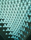 Triangles of Glass and Metal on an Airport Ceiling
