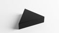 Triangular black box with a matte finish, placed on a white surface Royalty Free Stock Photo