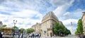 Triangular building with modern tram at the Place de la Comedie in Bordeaux, panorama view, France Royalty Free Stock Photo