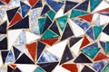 Triangular colorful mosaic texture on wall