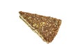 Triangular piece of walnut cake. Fresh pastries, top view. Close-up, isolate