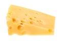 Triangular piece of yellow swiss cheese isolated Royalty Free Stock Photo