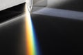 Triangular Prism dispersing sun beam splitting into a spectrum on white background Royalty Free Stock Photo