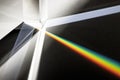 Triangular Prism dispersing sun beam splitting into a spectrum on white background Royalty Free Stock Photo