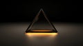 A triangular prism with a glowing orange interior is centered against a black background. Royalty Free Stock Photo