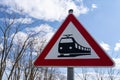 Railway crossing sign in the blue sky Royalty Free Stock Photo