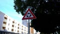 Triangular road sign instruct drivers move Roundabout