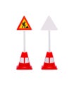 Triangular road works sign. Toy road sign isolated on white background Royalty Free Stock Photo