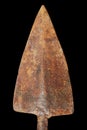 Triangular rusty tip of an old spear isolated Royalty Free Stock Photo