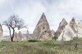 Triangular sandy rocks with caves. Beautiful unusual landscape. Tourism in the national park Royalty Free Stock Photo