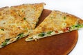 Triangular slices of pie with spinach
