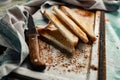 Triangular slices of toasted white bread with a soft texture inside and a crisp crust on the outside on a rusty metal background Royalty Free Stock Photo