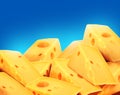 Triangular swiss cheeses in a blue background