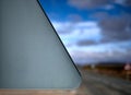 Triangular traffic sign seen from the rear on a road on a day wi