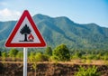 Forest fire warning sign in a rural landscape with mountains Royalty Free Stock Photo