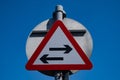 Triangular traffic sign warning of two way traffic ahead Ellesmere Port Cheshire July 2020 Royalty Free Stock Photo