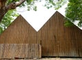 Triangular wooden warehouse to store agricultural crops Royalty Free Stock Photo