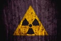Radioactive ionizing radiation danger symbol painted on a massive concrete wall