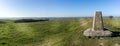 Triangulation point or station at the top of White Sheet Hill with beautiful panoramic views across the countryside in Wiltshire