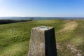 Triangulation point or station at the top of White Sheet Hill with beautiful panoramic views across the countryside in Wiltshire Royalty Free Stock Photo
