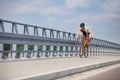 Triathlete biker putting on shoes during race